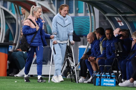 The England midfielder Keira Walsh returns to the bench on crutches