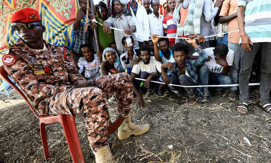 Ethiopians who fled war in Tigray at a camp on the Sudanese border.
