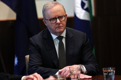 Anthony Albanese with a serious expression on his face during a meeting