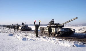Russian tanks near the border with Ukraine. US president Joe Biden says an invasion is still a ‘distinct possibility’.