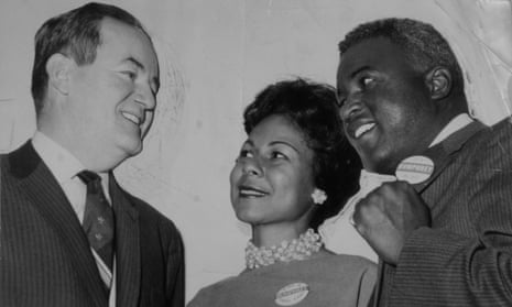 Hubert Humphrey meets Jackie Robinson of the Brooklyn Dodgers and his wife, Rachel Robinson, in Washington in 1950.
