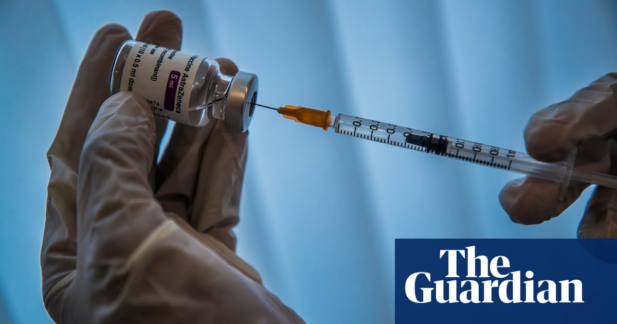 Doctors left 'ill-equipped' for Australia's Covid vaccine rollout criticise delayed launch of booking site