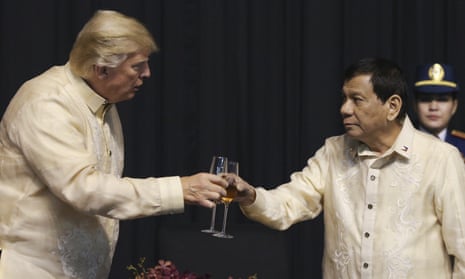 U.S. President Donald Trump toasts with Philippines President Rodrigo Duterte during the gala dinner marking ASEAN’s 50th anniversary in Manila, Philippines, Sunday, Nov. 12, 2017. (Athit Perawongmetha/Pool photo via AP)
