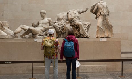 British Museum visitors look at the Parthenon marbles