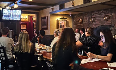 Watching the Queen's funeral at the Churchill Tavern in New York.