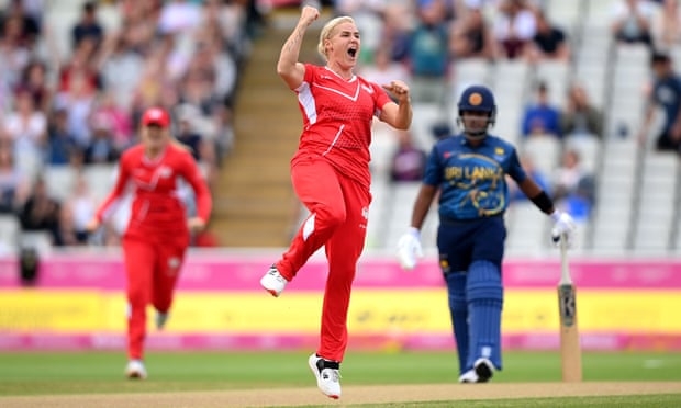 Katherine Brunt leaps in the air after taking Vishmi Gunaratne’s wicket with the first ball of the match