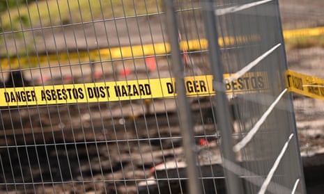 Warning tape around playground equipment at a park where asbestos has been found at Hosken Reserve in Coburg North.