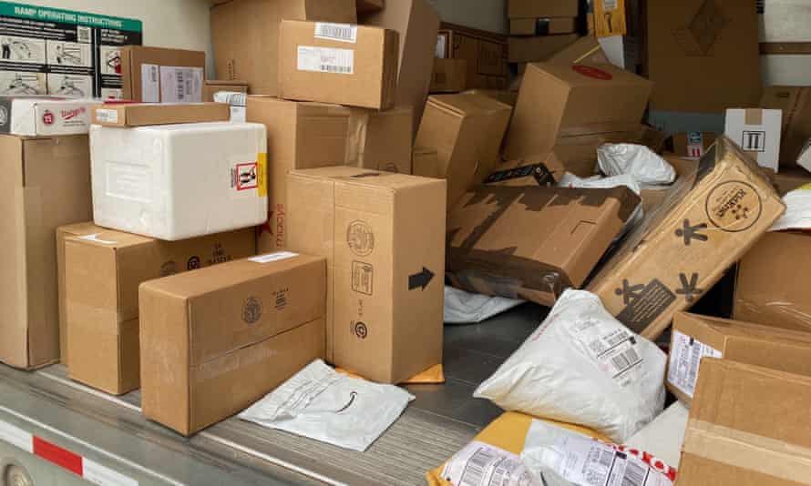 Packages in a rented U-Haul truck as they are delivered in a residential neighborhood in Wisconsin in December 2020.