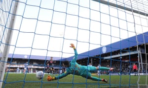 QPR’s Liam Kelly saves a penalty from Patrick Bamford, awarded for his own challenge on the Leeds forward
