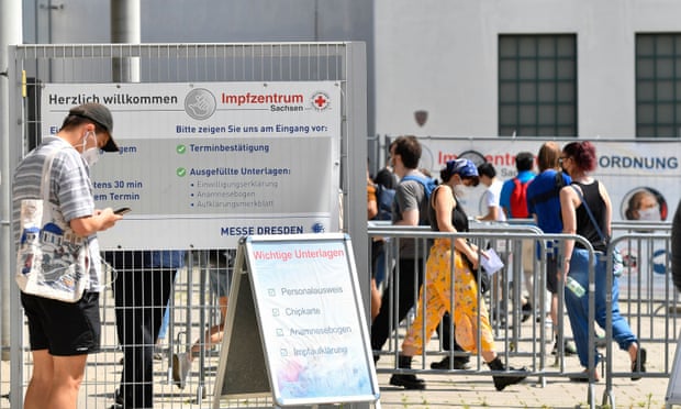 People line up at a vaccination centre in Dresden