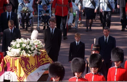 The sons of Diana, Princess of Wales, her brother and her former husband, the Prince of Wales, walk behind her coffin as the funeral procession approaches Westminster Abbey.