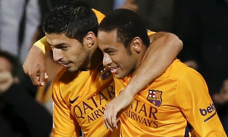 Barcelona’s Luis Suárez celebrates his goal against Getafe with Neymar.
