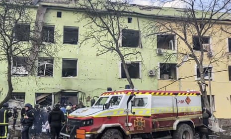 rescue vehicle outside damaged building