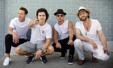 Lukas Graham, second left, and his band.