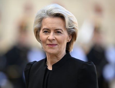 Ursula von der Leyen wearing a black jacket and pearls