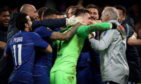 Kepa Arrizabalaga is mobbed after his saves helped Chelsea reach the Europa League final.