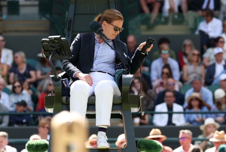 The chair umpire, Louise Azemar-Engzell, on the phone