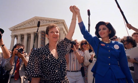 Norma McCorvey, left, and her attorney Gloria Allred hold hands as they leave the supreme court building. She later became a fierce opponent of abortion rights.