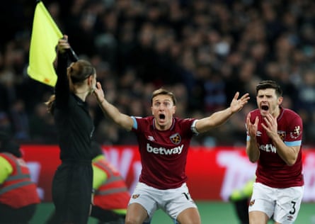 January 2: West Ham’s Mark Noble and Aaron Cresswell protest with a match official during their match against Brighton.