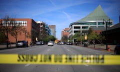 Crime scene tape cordons off a street as law enforcement officers respond to an active shooter near the Old National Bank building on April 10, 2023 in Louisville, Kentucky.