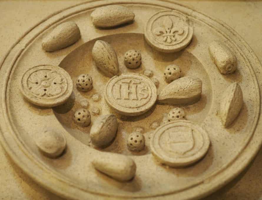 Another carving depicts cookies and almonds