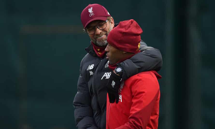Jürgen Klopp gives Georginio Wijnaldum a hug.
