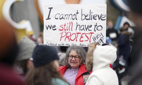 Diana Angus of Columbus holds a sign before the start of the Women’s March on Washington – Ohio Sister March. The main event is expected to be among the largest marches in US history.