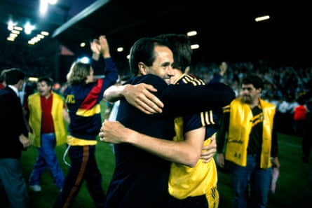 George Graham hugs Alan Smith after Arsenal won the First Division title at Anfield in 1989.