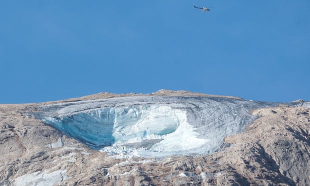 A huge chunk of the rapidly melting glacier on the Marmolada peak in the Dolomites broke off on Sunday.
