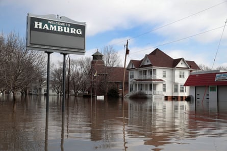 A home is surrounded by floodwater in Hamburg, Iowa. A huge flow of water breached the Missouri river levees, flooding the town.