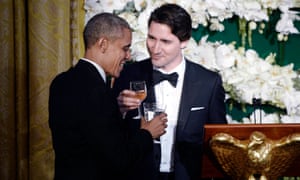 Justin Trudeau and Barack Obama at the White House state dinner reception. The pair are seen as in step on key issues.