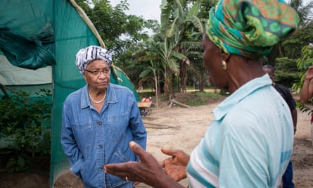 Personal appeal: Ellen Johnson Sirleaf hears a woman’s appeal at her farm.