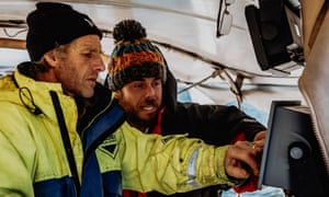 Ross Edgley with his support crew member Matt Knight, on board on board the catamaran Hecate.