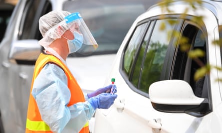 Healthcare workers at a drive-through Covid testing facility in Shepparton