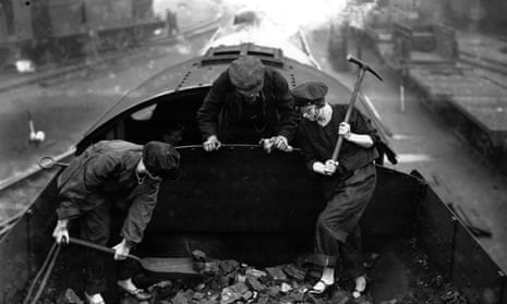 Female engine drivers turn their hand to coal shovelling during the General Strike of 1926.