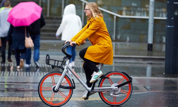 Helen Pidd in Manchester on a Mobike
