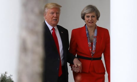 Donald Trump holds hands with Theresa May during her two-day visit to Washington which included trade talks. 