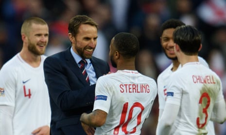 Gareth Southgate celebrates with Raheem Sterling after the dramatic 2-1 win over Croatia.
