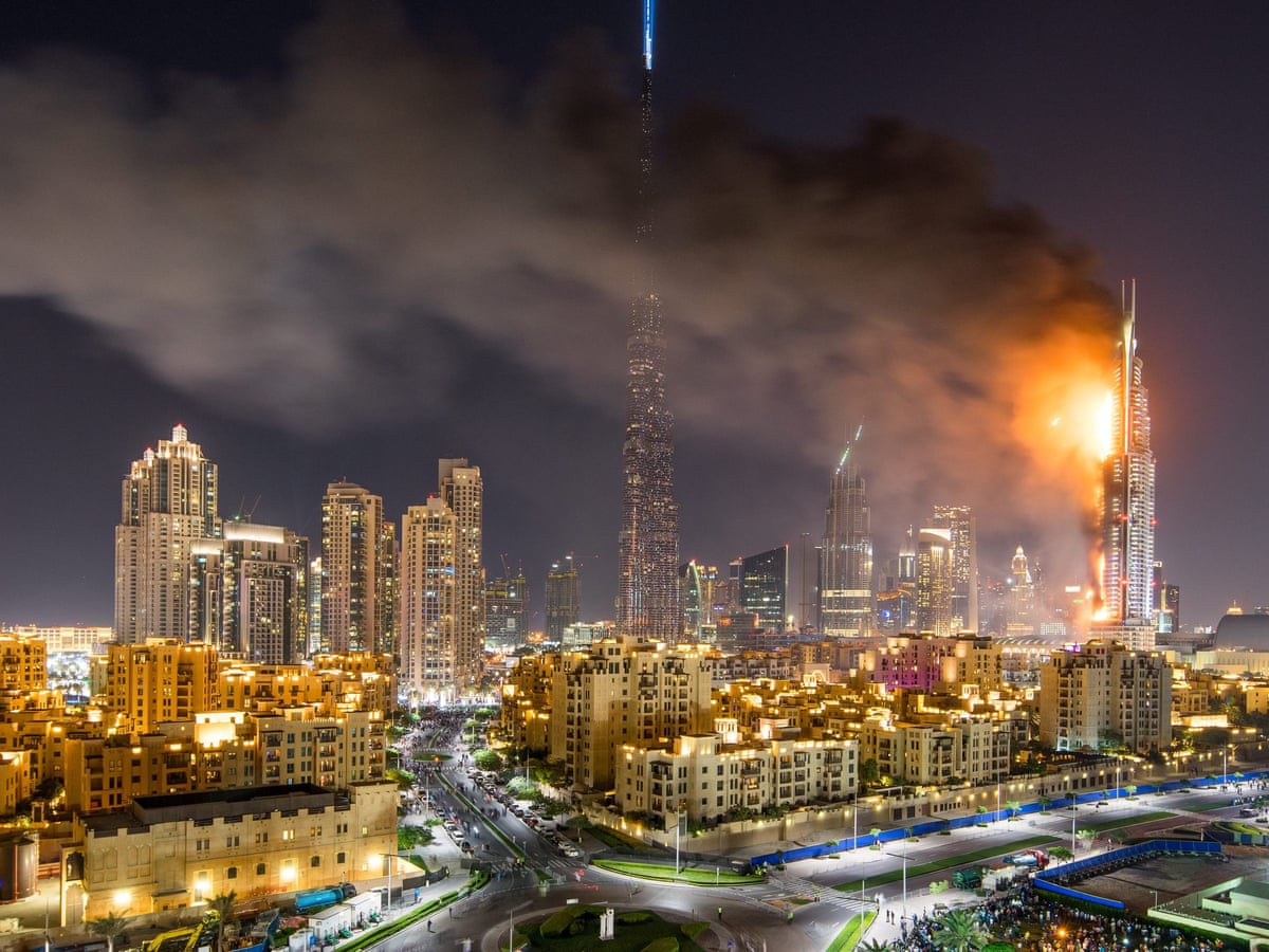 Massive Fire At Dubai Skyscraper Interrupts New Year S Eve Fireworks Dubai The Guardian