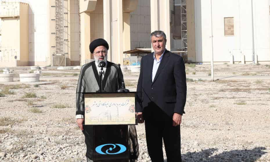 Iran’s president, Ebrahim Raisi, and its atomic energy association head, Mohammad Eslami, at Bushehr nuclear power plant in Tehran on 8 October. Eslami has told state media Iran has 120kg of 20% enriched uranium