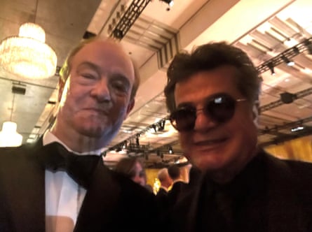 Peter Bradshaw with Jafar Panahi who is wearing dark sunglasses.