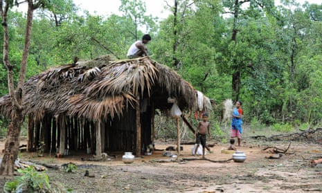 A family builds a shelter in Khammam district, having fled the Maoist insurgency-hit Chhattisgarh state.