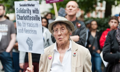 Demonstrators in London stand in solidarity with Charlottesville, Virginia, after an attack over the weekend killed a women who was protesting a neo-Nazi rally.