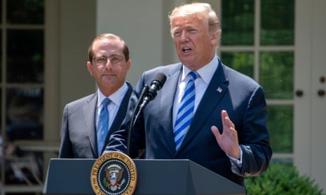 Donald Trump and Alex Azar, the US health secretary, in the White House rose garden on 11 May.