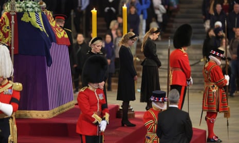 Queen Elizabeth II’s grandchildren (left-right) Zara Tindall, Lady Louise Windsor and Princess Beatrice hold a vigil beside the coffin of their grandmother as it lies in state on the catafalque in Westminster Hall, at the Palace of Westminster in London.