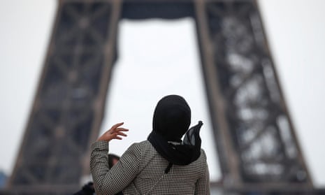 A woman wearing a hijab in Paris.