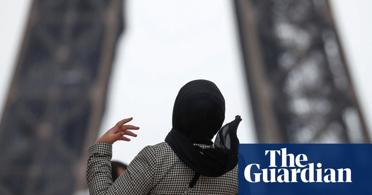 Macron's party moots banning headscarves in public for under-15s