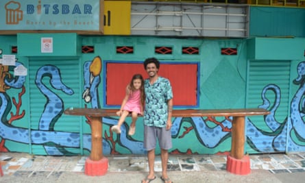 Matías Llaituqueo, right, who provides Spanish language classes; pictured with is daughter.