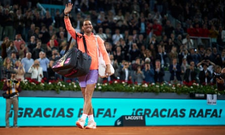Rafael Nadal waves goodbye to fans after a special presentation to celebrate his five career titles in Madrid