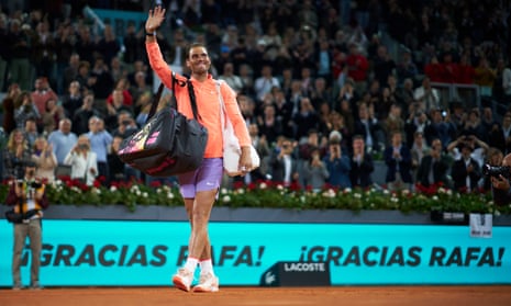 Rafael Nadal waves goodbye to fans after a special presentation to celebrate his five career titles in Madrid.